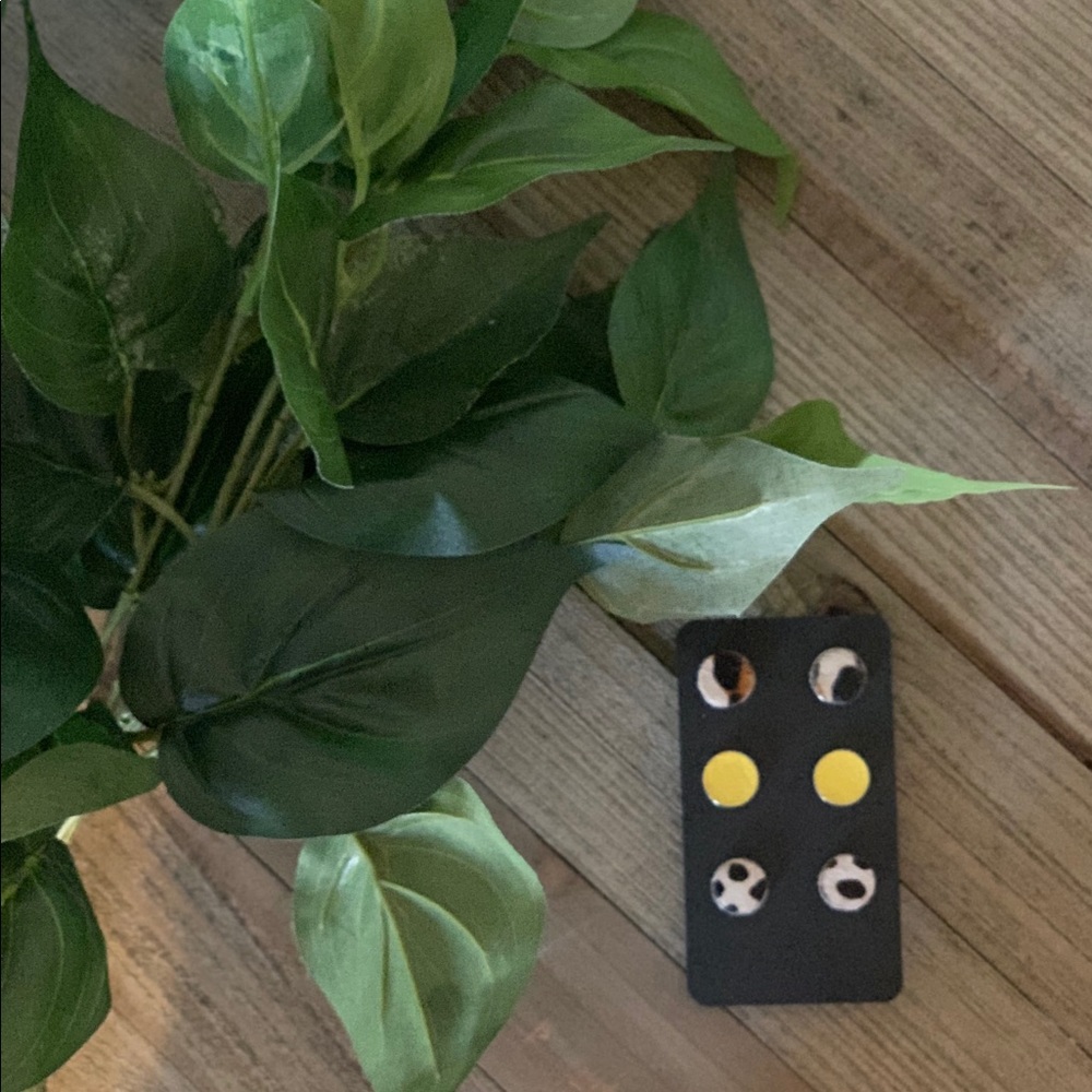 Three set leather stud earrings
